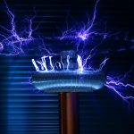 A Tesla coil producing powerful electric arcs in a dark setting.